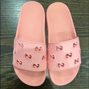 100% Authentic Rose color Rubber Gucci Slides. Women size 8. Good used condition
